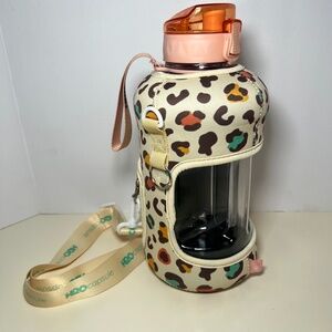H2O Capsule Water Jug With Cheetah Print Sleeve and Strap Beige Color Scheme